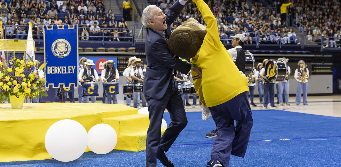 rich lyons dancing with oski at convocation