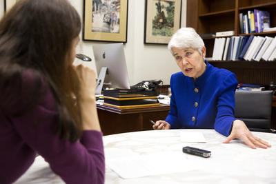 Chancellor Christ sits with student